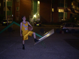 Me, posing with my foot on the backboard of the dead basket.